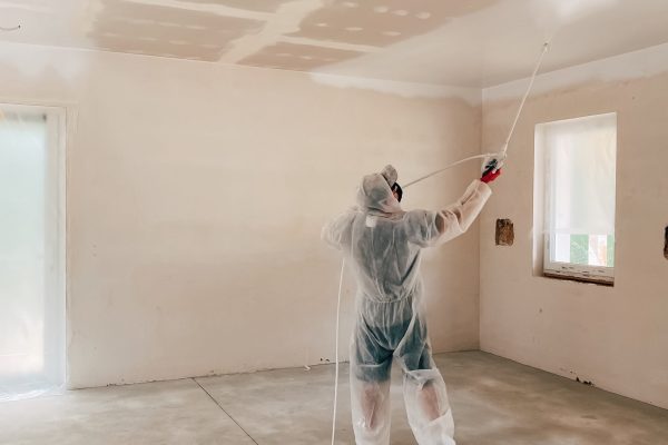 man-paints-ceiling-with-a-paint-sprayer-2025-01-09-07-44-30-utc